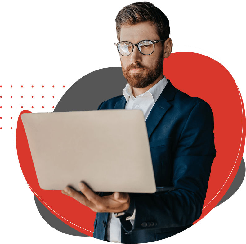 Man in suit using laptop, abstract background.