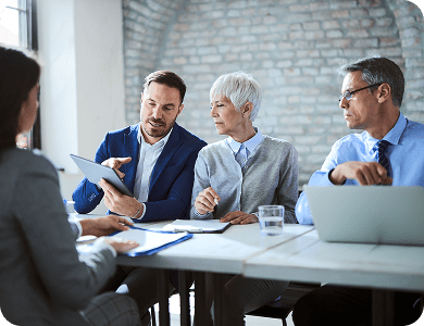 Business team meeting in a professional setting.